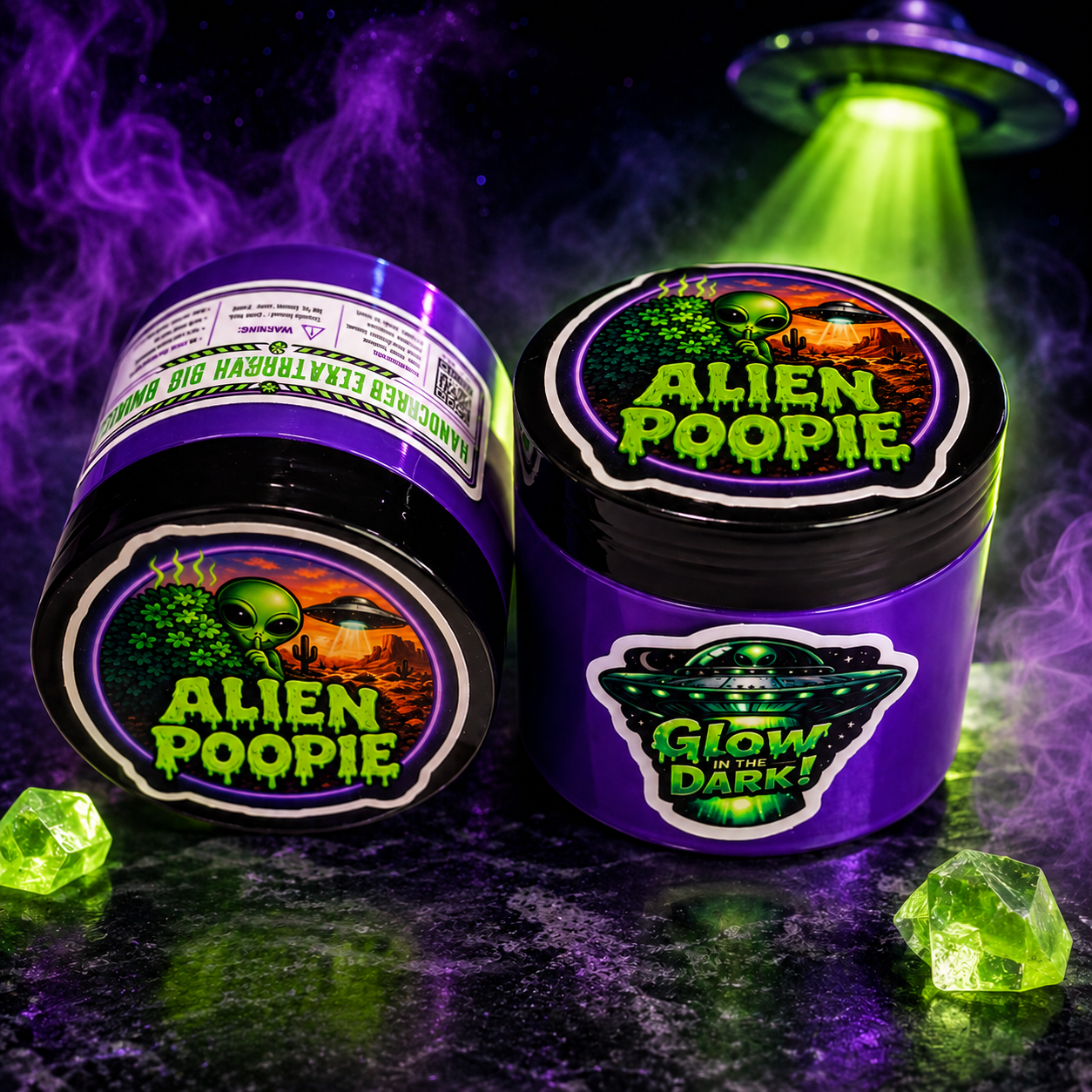 Two Alien Poopie Glow tubs, one on its side showing the label